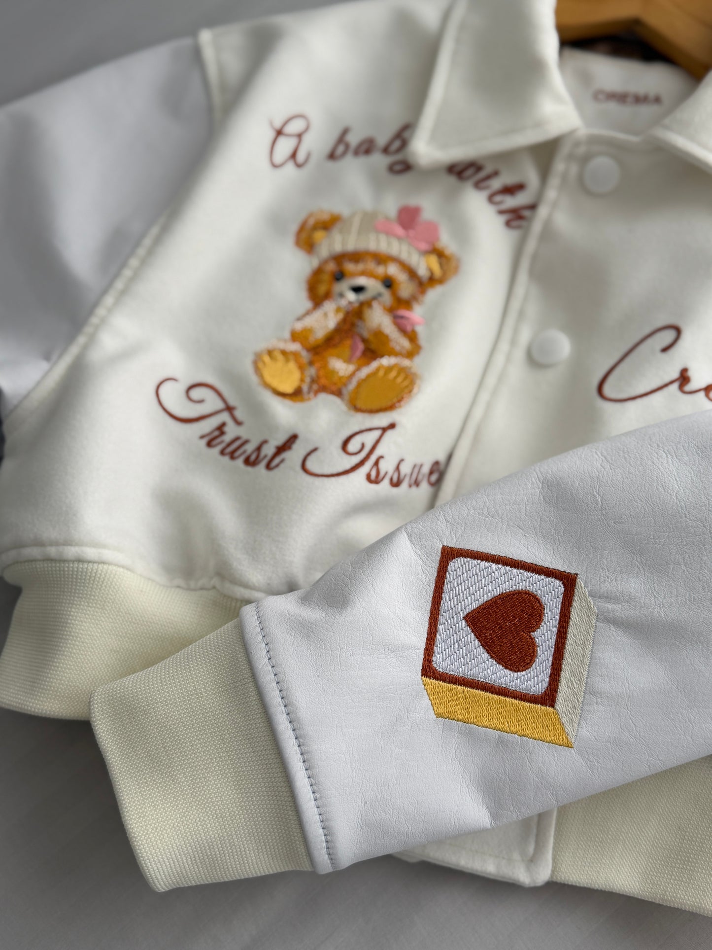 Cropped Varsity Jacket "Trust Issues"